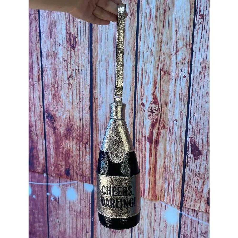 Kate Spade Cheers Darling Champagne Bottle Wristlet EUC Rose Gold RARE